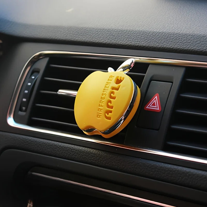 An apple-shaped car air freshener with floral fragrance - featuring a decorative ventilation clip design My Store